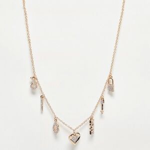 ALDO Bow and Arrow multi charm necklace